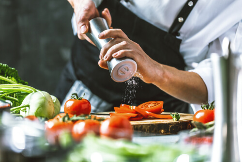Chef,Cook,Preparing,Vegetables,In,His,Kitchen.